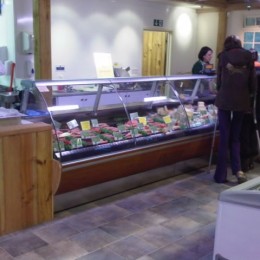Curved glass jordao in butchery and delicatessen  in farm shop 